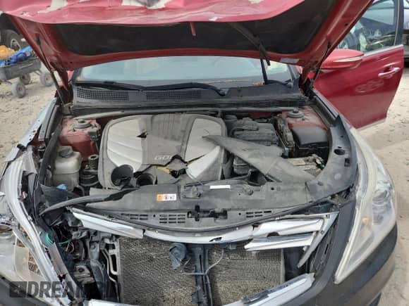 2014 Hyundai Azera z VIN KMHFG4JG0EA348385, wystawiony jako Copart lot #71237155 z przebiegiem 134 921 mil mil oraz Szkoda całkowita • Salvage title. Historia ofert i sprzedaży dostępna na DreamBid. Obrazek 11.