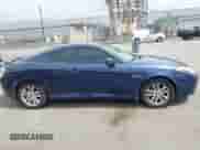 2007 Hyundai Tiburon GS with VIN KMHHM66D47U253809, listed as a IAAI auction lot 42777962 with 176,002 mi miles and . Bid and sale history available at DreamBid. Image 13.