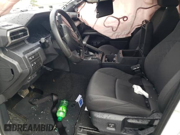 2024 Toyota Tacoma SR with VIN 3TYKD5HN5RT010399, listed as a Copart auction lot 65425115 with Not provided miles and Salvage title. Bid and sale history available at DreamBid. Image 7.