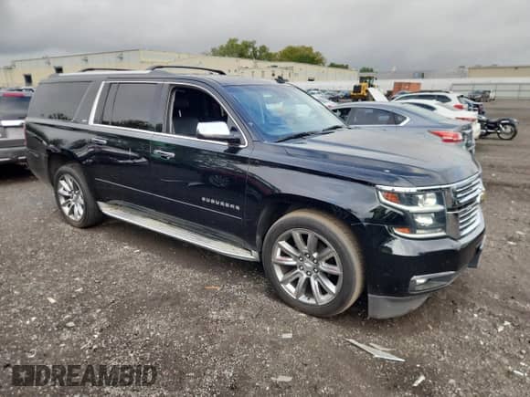 2015 Chevrolet Suburban LTZ с VIN 1GNSKKKC5FR192050, выставлен на аукционе Copart как лот 71635945 с пробегом 235 667 миль миль и Списание • Salvage title. История ставок и продаж доступна на DreamBid. Изображение 4.