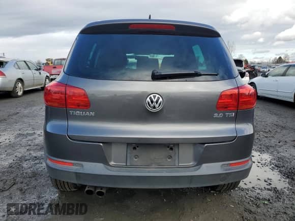 2013 Volkswagen Tiguan SE z VIN WVGAV3AX2DW607051, wystawiony jako Copart lot #44391625 z przebiegiem 61 220 mil mil oraz Szkoda całkowita • Salvage title. Historia ofert i sprzedaży dostępna na DreamBid. Obrazek 6.