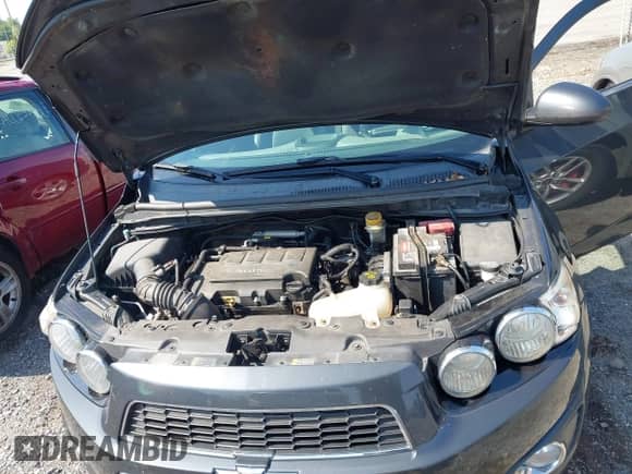 2014 Chevrolet Sonic LTZ with VIN 1G1JE5SB5E4225055, listed as a IAAI auction lot 42841720 with 141,716 mi miles and . Bid and sale history available at DreamBid. Image 10.