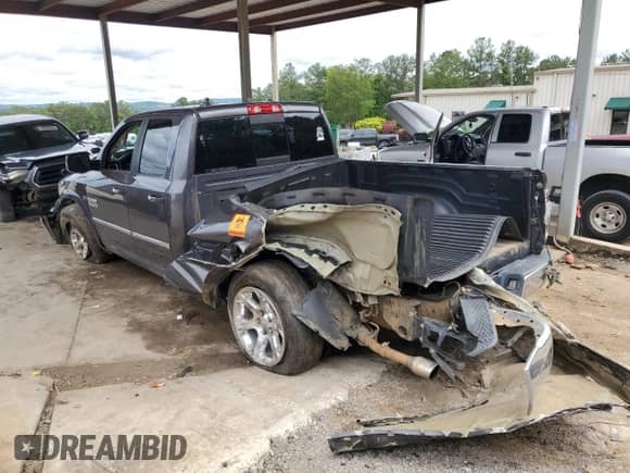 2015 Ram 1500 Laramie z VIN 1C6RR6JT6FS621613, wystawiony jako Copart lot #58815805 z przebiegiem Nie podano mil oraz Szkoda całkowita • Salvage title. Historia ofert i sprzedaży dostępna na DreamBid. Obrazek 2.