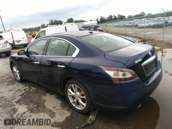 2014 Nissan Maxima S z VIN 1N4AA5AP7EC469138, wystawiony jako IAAI lot #43024312 z przebiegiem 103 901 mil mil oraz . Historia ofert i sprzedaży dostępna na DreamBid. Obrazek 3.