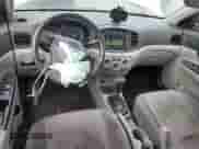 2011 Hyundai Accent GLS with VIN KMHCN4AC7BU607485, listed as a Copart auction lot 81957435 with 141,057 mi miles and Salvage title. Bid and sale history available at DreamBid. Image 8.