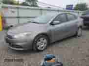 2014 Dodge Dart SE with VIN 1C3CDFAA2ED738222, listed as a Copart auction lot 58055965 with 147,619 mi miles and Salvage title. Bid and sale history available at DreamBid. Image 1.