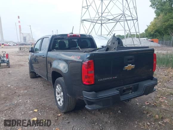 2018 Chevrolet Colorado 4WD LT with VIN 1GCGTCEN2J1148884, listed as a IAAI auction lot 43001742 with 97,894 mi miles and . Bid and sale history available at DreamBid. Image 3.