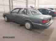 1991 Toyota Camry DLX z VIN 4T1SV21E1MU391430, wystawiony jako IAAI lot #42897399 z przebiegiem 151 914 mil mil oraz . Historia ofert i sprzedaży dostępna na DreamBid. Obrazek 3.