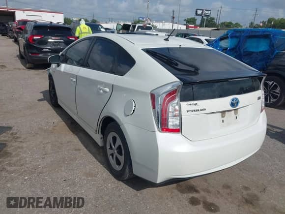 2015 Toyota Prius Four z VIN JTDKN3DU7F1917285, wystawiony jako IAAI lot #42536395 z przebiegiem 265 498 mil mil oraz . Historia ofert i sprzedaży dostępna na DreamBid. Obrazek 3.