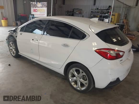 2017 Chevrolet Cruze Premier z VIN 3G1BF6SM0HS603053, wystawiony jako IAAI lot #42439222 z przebiegiem Nie podano mil oraz . Historia ofert i sprzedaży dostępna na DreamBid. Obrazek 3.