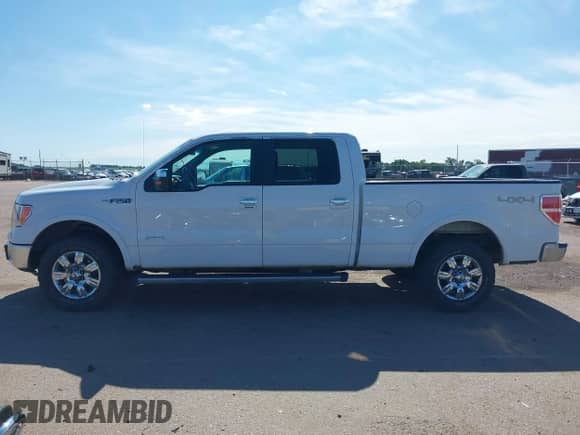 2011 Ford F-150 XLT z VIN 1FTFW1ET2BFC65701, wystawiony jako IAAI lot #42598794 z przebiegiem 209 676 mil mil oraz . Historia ofert i sprzedaży dostępna na DreamBid. Obrazek 14.