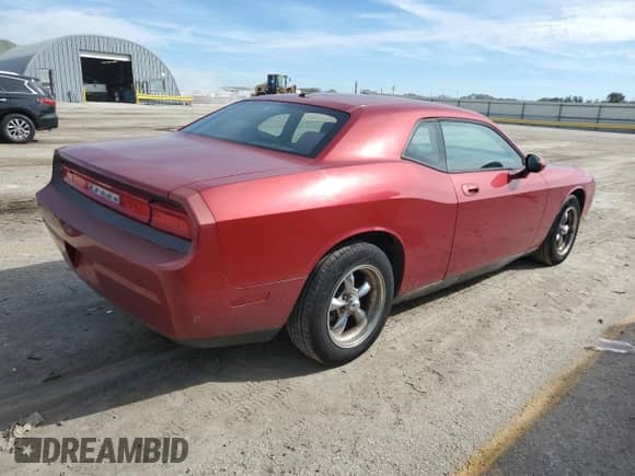 2010 Dodge Challenger SE с VIN 2B3CJ4DV9AH289353, выставлен на аукционе Copart как лот 81883665 с пробегом 104 505 миль миль и Списание • Salvage title. История ставок и продаж доступна на DreamBid. Изображение 3.