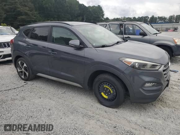 2018 Hyundai Tucson Value with VIN KM8J33A27JU804556, listed as a Copart auction lot 84006025 with 90,520 mi miles and Clean title. Bid and sale history available at DreamBid. Image 4.