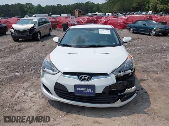 2015 Hyundai Veloster with VIN KMHTC6ADXFU232692, listed as a IAAI auction lot 42407054 with 80,745 mi miles and . Bid and sale history available at DreamBid. Image 12.