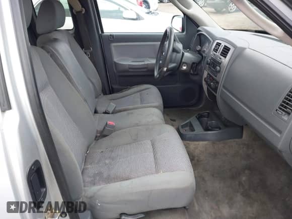 2007 Dodge Dakota SLT with VIN 1D7HE42K97S126808, listed as a IAAI auction lot 42189660 with 232,109 mi miles and . Bid and sale history available at DreamBid. Image 5.