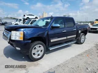 2010 Chevrolet Silverado 1500 LTZ with VIN 3GCRKTE32AG254022, listed as a Copart auction lot 72024015 with 185,446 mi miles and Salvage title. Bid and sale history available at DreamBid. Image 1.