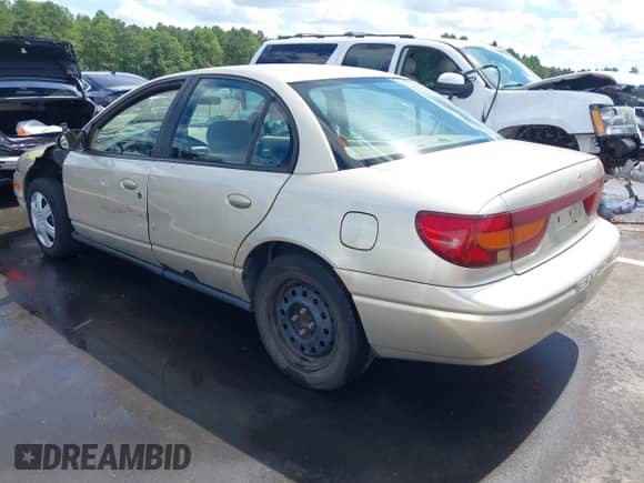 2002 Saturn SL с VIN 1G8ZK52712Z234021, выставлен на аукционе IAAI как лот 43119833 с пробегом 292 780 миль миль и . История ставок и продаж доступна на DreamBid. Изображение 3.