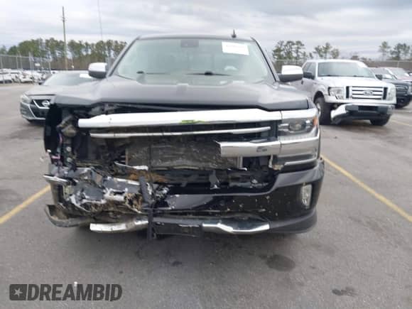 2018 Chevrolet Silverado 1500 High Country z VIN 3GCUKTEJ6JG178894, wystawiony jako IAAI lot #41606265 z przebiegiem 148 068 mil mil oraz . Historia ofert i sprzedaży dostępna na DreamBid. Obrazek 12.