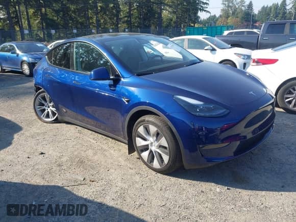 2023 Tesla Model Y Long Range with VIN 7SAYGDEE3PF957974, listed as a IAAI auction lot 43275987 with 20,712 mi miles and . Bid and sale history available at DreamBid. Image 1.