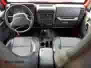 2000 Jeep Wrangler SE with VIN 1J4FA29P8YP711686, listed as a Copart auction lot 68999455 with 100,108 mi miles and Salvage title. Bid and sale history available at DreamBid. Image 8.