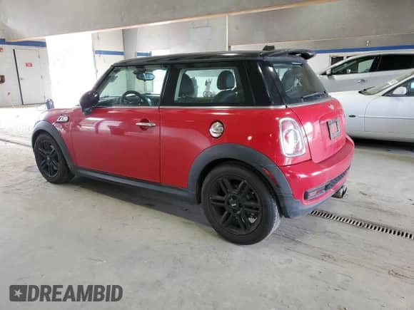 2013 MINI Hardtop S with VIN WMWSV3C5XDT392313, listed as a Copart auction lot 84942945 with 64,086 mi miles and Salvage title. Bid and sale history available at DreamBid. Image 2.
