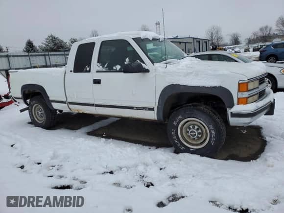 1998 Chevrolet Silverado 2500 с VIN 1GCGK29R7WE134344, выставлен на аукционе Copart как лот 43238025 с пробегом 141 347 миль миль и Списание • Salvage title. История ставок и продаж доступна на DreamBid. Изображение 4.