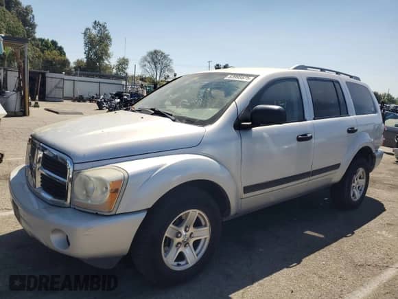 2004 Dodge Durango SLT z VIN 1D4HD48D94F132718, wystawiony jako Copart lot #53995525 z przebiegiem 287 165 mil mil oraz Czysty tytuł • Clean title. Historia ofert i sprzedaży dostępna na DreamBid. Obrazek 1.