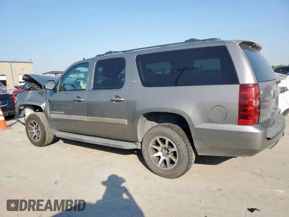 2007 Chevrolet Suburban LT с VIN 1GNFC16017J406329, выставлен на аукционе Copart как лот 81088985 с пробегом Не указан миль и Списание • Salvage title. История ставок и продаж доступна на DreamBid. Изображение 2.