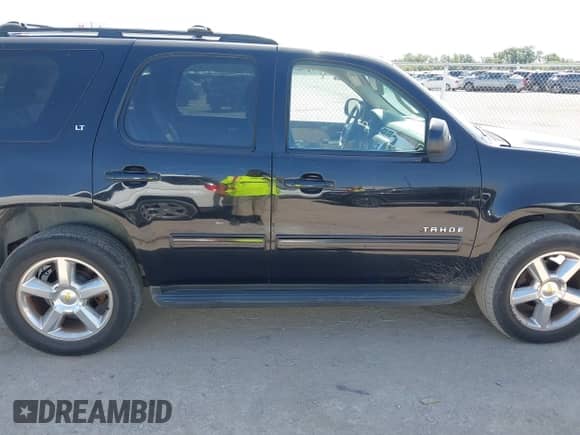2012 Chevrolet Tahoe LT with VIN 1GNSCBE04CR209625, listed as a IAAI auction lot 42859676 with 198,472 mi miles and . Bid and sale history available at DreamBid. Image 13.