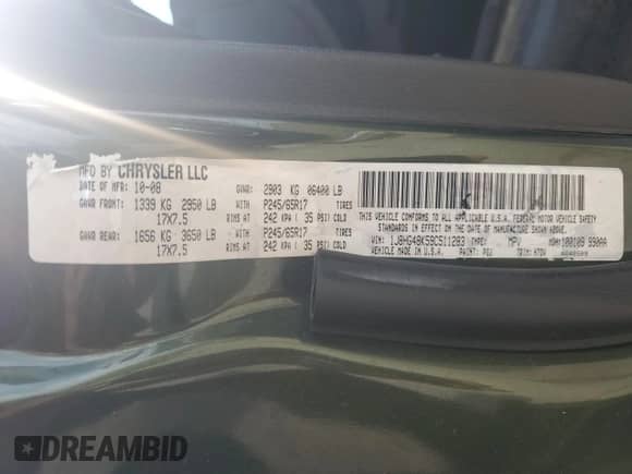 2009 Jeep Commander Sport with VIN 1J8HG48K59C511283, listed as a Copart auction lot 69678195 with 236,781 mi miles and Salvage title. Bid and sale history available at DreamBid. Image 14.