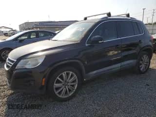 2011 Volkswagen Tiguan SE with VIN WVGAV7AX2BW556977, listed as a Copart auction lot 64801375 with 174,948 mi miles and Salvage title. Bid and sale history available at DreamBid. Image 1.