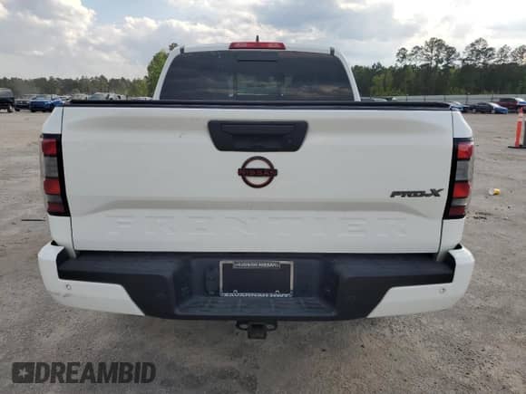 2023 Nissan Frontier Pro-X with VIN 1N6ED1EJ6PN661933, listed as a Copart auction lot 52496135 with 28,533 mi miles and Salvage title. Bid and sale history available at DreamBid. Image 6.