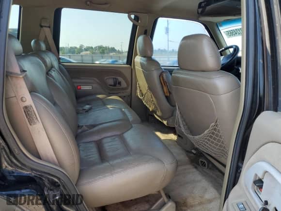1996 Chevrolet Tahoe с VIN 1GNEK13R3TJ378433, выставлен на аукционе Copart как лот 69124565 с пробегом 331 337 миль миль и Списание • Salvage title. История ставок и продаж доступна на DreamBid. Изображение 11.