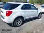 2013 Chevrolet Equinox LT z VIN 2GNALDEK6D6289578, wystawiony jako IAAI lot #43111190 z przebiegiem 146 801 mil mil oraz . Historia ofert i sprzedaży dostępna na DreamBid. Obrazek 4.