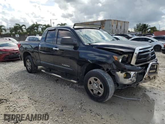 2012 Toyota Tundra z VIN 5TFRU5F13CX026371, wystawiony jako Copart lot #77576564 z przebiegiem 112 512 mil mil oraz Szkoda całkowita • Salvage title. Historia ofert i sprzedaży dostępna na DreamBid. Obrazek 4.