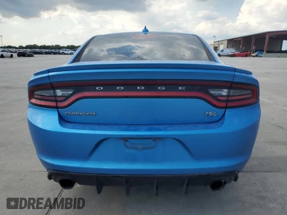 2016 Dodge Charger R/T with VIN 2C3CDXCT4GH214791, listed as a Copart auction lot 57285285 with 143,628 mi miles and Salvage title. Bid and sale history available at DreamBid. Image 6.