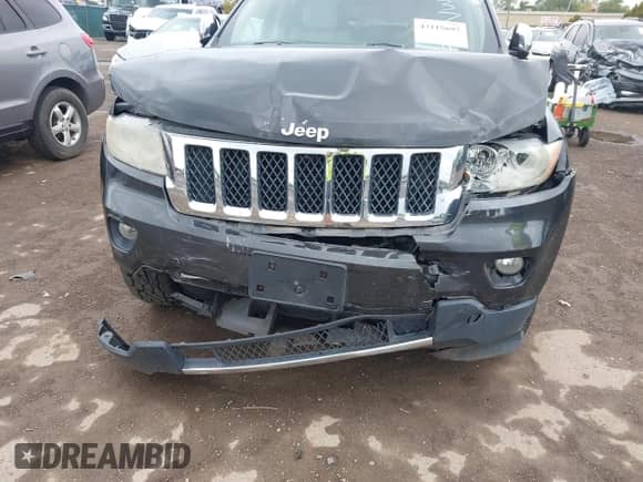 2011 Jeep Grand Cherokee Overland z VIN 1J4RR6GG5BC737094, wystawiony jako IAAI lot #43115697 z przebiegiem 184 207 mil mil oraz . Historia ofert i sprzedaży dostępna na DreamBid. Obrazek 6.