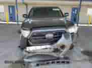 2018 Toyota Tacoma SR z VIN 5TFAX5GN8JX127117, wystawiony jako Copart lot #64761315 z przebiegiem 136 825 mil mil oraz Szkoda całkowita • Salvage title. Historia ofert i sprzedaży dostępna na DreamBid. Obrazek 5.