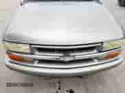 2002 Chevrolet Blazer LS with VIN 1GNCS13W32K129233, listed as a Copart auction lot 63417545 with 202,670 mi miles and Salvage title. Bid and sale history available at DreamBid. Image 12.