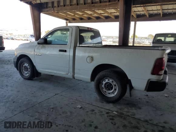 2012 Ram 1500 ST with VIN 3C6JD6AK8CG197518, listed as a Copart auction lot 83826595 with 210,666 mi miles and Clean title. Bid and sale history available at DreamBid. Image 2.