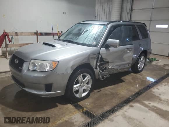 2007 Subaru Forester Special Sports XT z VIN JF1SG696X7H725959, wystawiony jako Copart lot #86597334 z przebiegiem 56 997 mil mil oraz Szkoda całkowita • Salvage title. Historia ofert i sprzedaży dostępna na DreamBid. Obrazek 1.