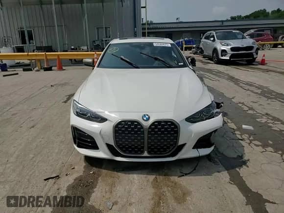 2021 BMW 4 Series M440i xDrive с VIN WBA13AR04MCF74724, выставлен на аукционе Copart как лот 59580625 с пробегом 76 810 миль миль и Списание • Salvage title. История ставок и продаж доступна на DreamBid. Изображение 14.