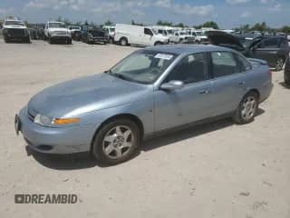 2002 Saturn LS with VIN 1G8JW54R62Y581480, listed as a Copart auction lot 61872955 with 85,357 mi miles and Salvage title. Bid and sale history available at DreamBid. Image 1.