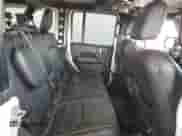 2022 Jeep Wrangler Unlimited Sahara with VIN 1C4JJXP62NW266791, listed as a Copart auction lot 64863535 with 61,452 mi miles and Salvage title. Bid and sale history available at DreamBid. Image 10.