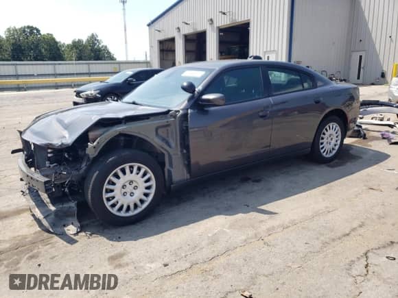 2021 Dodge Charger Police с VIN 2C3CDXKG9MH581945, выставлен на аукционе Copart как лот 67145615 с пробегом 58 454 миль миль и Списание • Salvage title. История ставок и продаж доступна на DreamBid. Изображение 1.