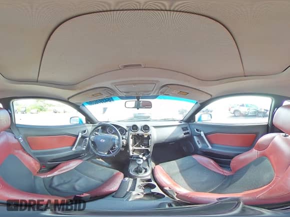 2007 Hyundai Tiburon GT с VIN KMHHN66F17U239526, выставлен на аукционе Copart как лот 64397625 с пробегом 136 807 миль миль и Списание • Salvage title. История ставок и продаж доступна на DreamBid. Изображение 14.