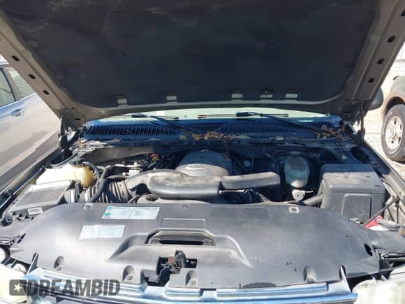 2003 Chevrolet Tahoe LT z VIN 1GNEC13Z83R104031, wystawiony jako IAAI lot #43337191 z przebiegiem Nie podano mil oraz . Historia ofert i sprzedaży dostępna na DreamBid. Obrazek 10.