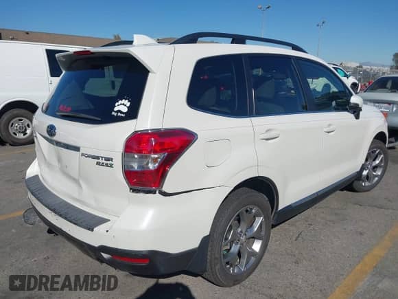 2016 Subaru Forester Touring with VIN JF2SJAXC4GH537026, listed as a IAAI auction lot 43501461 with 66,452 mi miles and . Bid and sale history available at DreamBid. Image 4.