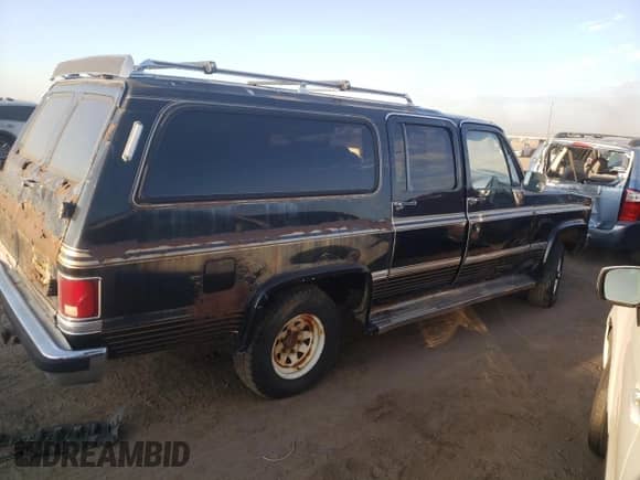 1988 Chevrolet Suburban с VIN 1GBEV16K7JF127952, выставлен на аукционе Copart как лот 76145144 с пробегом 942 545 миль миль и Чистый • Clean title. История ставок и продаж доступна на DreamBid. Изображение 3.