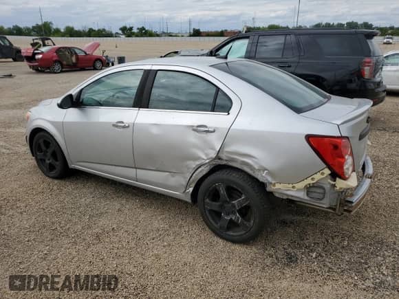 2013 Chevrolet Sonic LTZ с VIN 1G1JE5SH7D4152807, выставлен на аукционе Copart как лот 58600395 с пробегом 129 542 миль миль и Списание • Salvage title. История ставок и продаж доступна на DreamBid. Изображение 2.